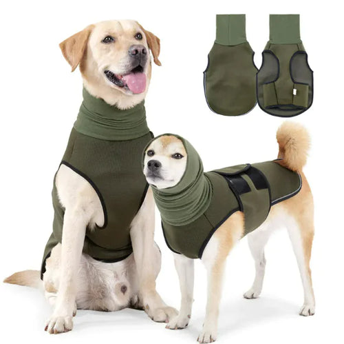 Two dogs wearing green anti-anxiety jackets. The soft breathable vests apply a calming pressure. Vest displayed in background.