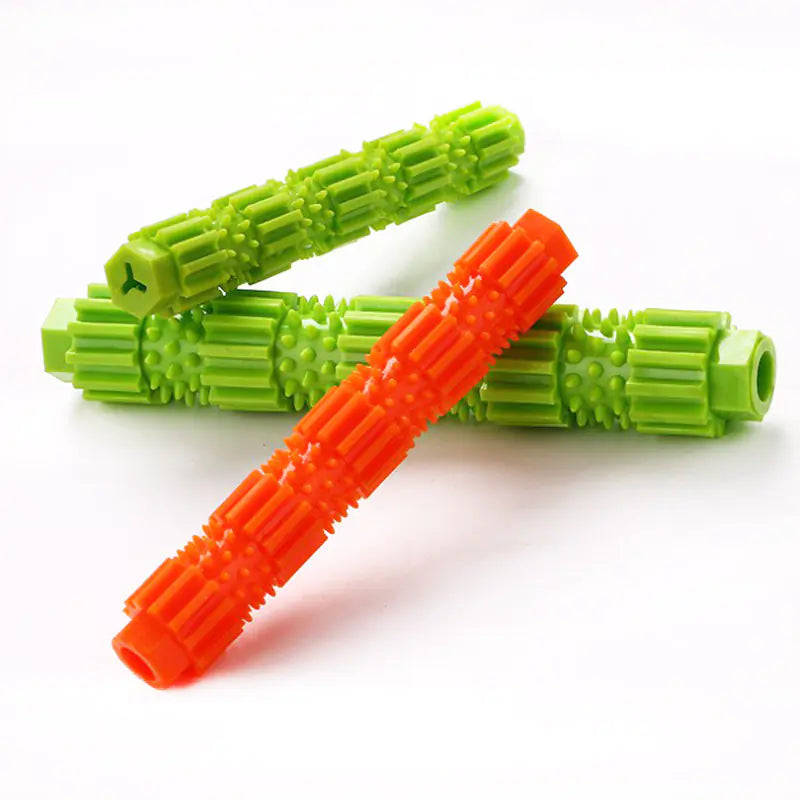 Three Green (Spring) and Orange (Autumn) colored rubber dog chew toys are shown. The chew toys are of various sizws and colors.