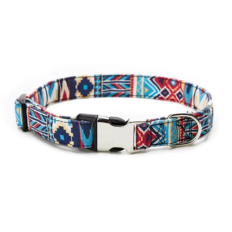 Multicolored patterned dog collar with a metal buckle on a white background