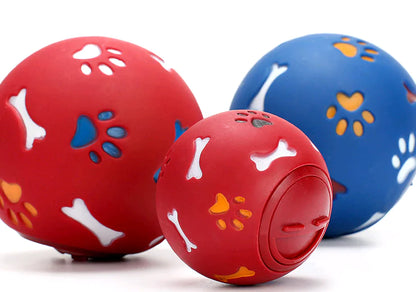Red (Ruby) and Blue (Lake) Dog Puzzle Treat Balls of various size. Balls will stimulate and reward your playful doggie.