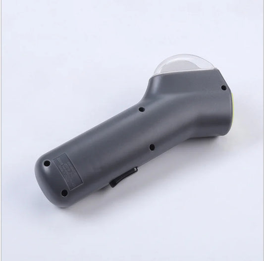 Gray (Mist) colored dog treat launcher with a transparent container on the top end, designed for interactive play and treat distribution.
