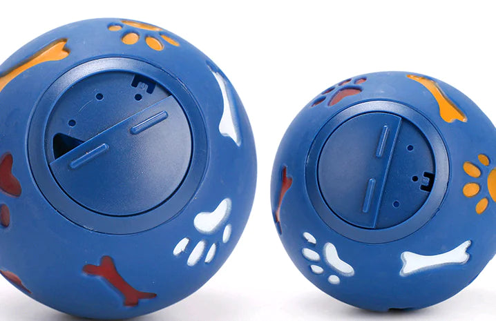 Two Blue (Lake) Dog Puzzle Treat Balls of various size. Balls will stimulate and reward your playful puppy.