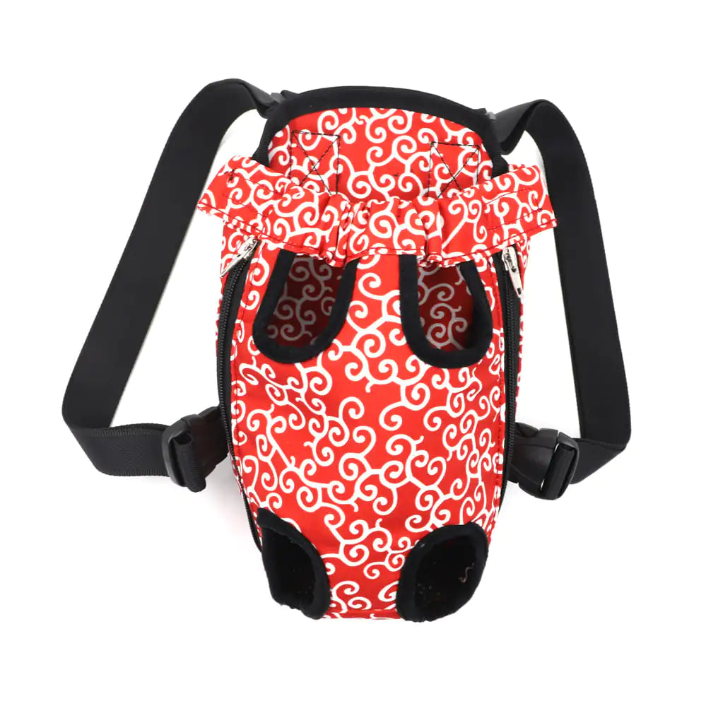 A Red (Ruby) canvas doggy carrier backpack with a white swirl pattern, featuring adjustable straps and a padded base.