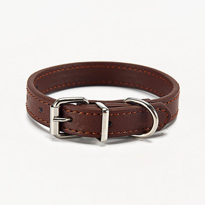 Soft adjustable Brown (Coffee)  leather puppy collar with silver buckle on a white background