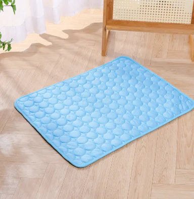 Blue non-toxic breathable pet cooling mat. lightweight and pressure-activated cooling design. A perfect dog chill spot. 