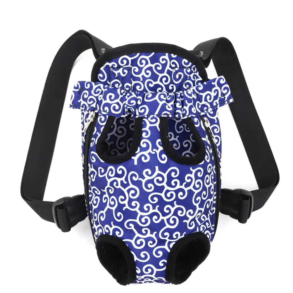 A Blue (Ocean) canvas puppy carrier backpack with a white swirl pattern, featuring adjustable straps and a padded base.
