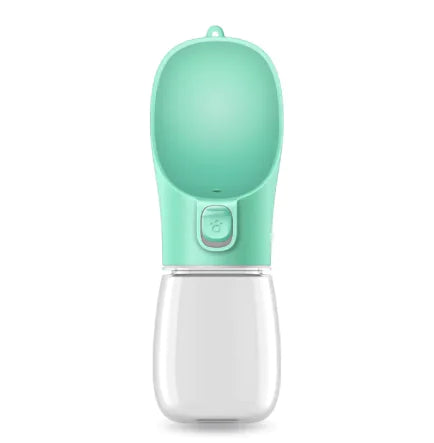 A green portable dog travel water bottle with a built-in foldable drinking trough and a carabiner clip. Safe BPA-free materials.