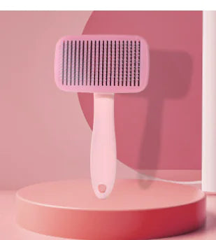 Pink (Rose) colored  Pet Hair Removal Comb. The comb's stainless steel bristles effectively remove your dog's loose hair.