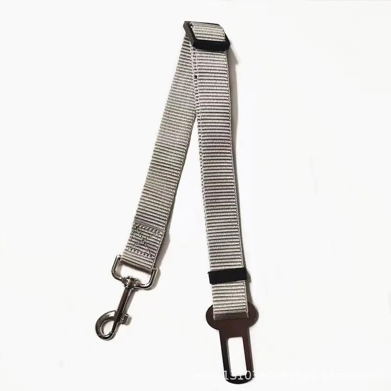 Gray (Mist) adjustable car dog seat belt with a clip that attaches to your dog's collar. Keep your pet safe while traveling.
