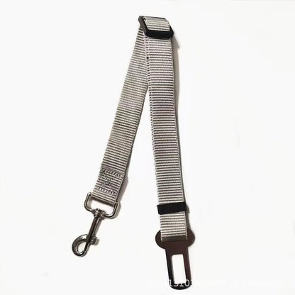 Gray (Mist) adjustable car dog seat belt with a clip that attaches to your dog's collar. Keep your pet safe while traveling.