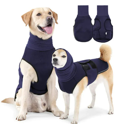 Two puppies wearing blue anti-anxiety  jackets. The soft breathable vests apply a calming pressure. Vest displayed in background.
