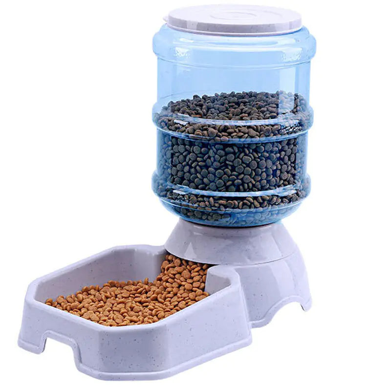 A White (Pearl) gravity fed food dispenser for your pet is shown. This system will provide food access for your dog throughout the day.