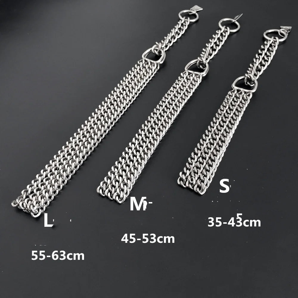 Three silver dog trainer collars of different  lengths on a gray background