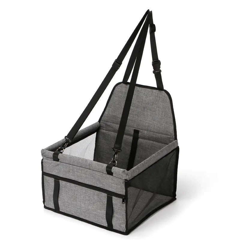 A Gray (Mist) foldable doggie safety seat car bag with adjustable straps and a mesh window.