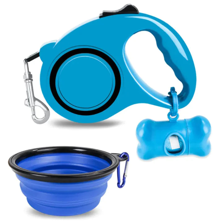 Blue (Lake) doggy travel kit including a retractable dog leash, a foldable bowl, and a holder with garbage bag dispensing functionality.