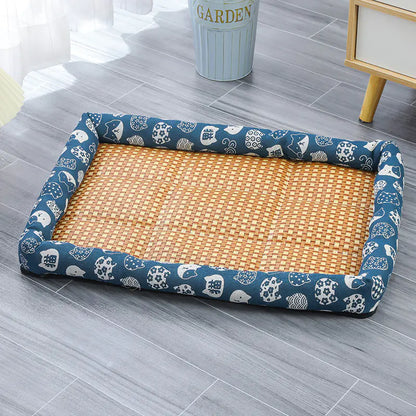 Rectangular pet cooling mat with a dark blue border and a beige center, on the floor creating a dog chill spot.