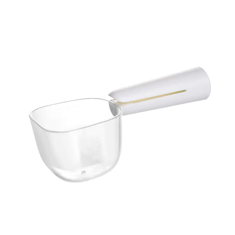 Clear scoop that can be used to precisely measure dog food. The White (Pearl) handle, doubles as a bag clip.