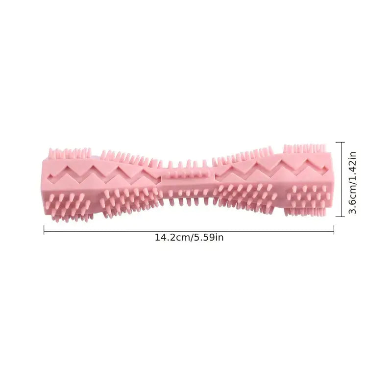 Pink dog chew toy with textured surface and measurements on a white background