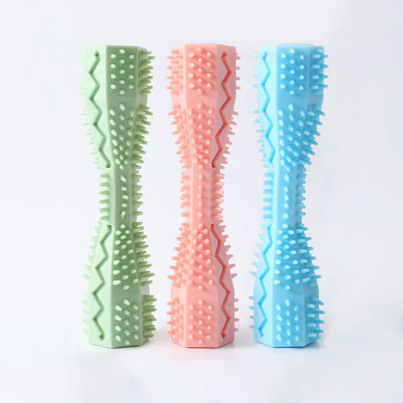Three rubber doggie dental sticks with textured bristles and ridges for cleaning teeth and massaging gums.