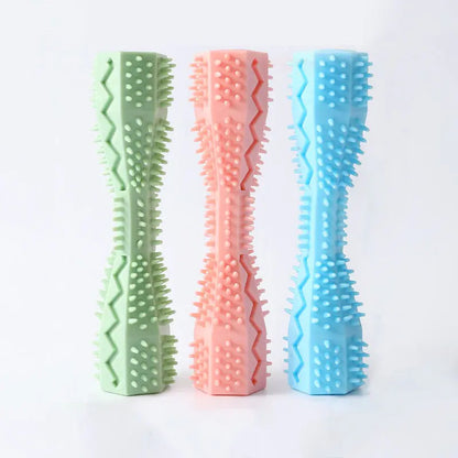 Three rubber doggie dental sticks with textured bristles and ridges for cleaning teeth and massaging gums.