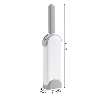White and gray electrostatic hair cleaning brush in related container with dimensions on a white background
