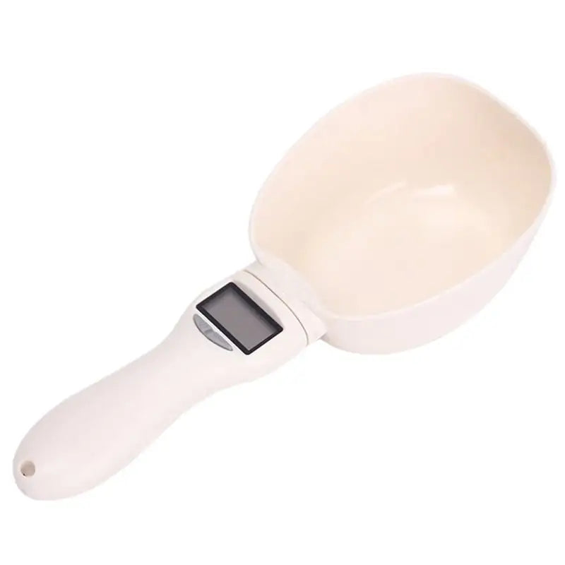 A White (Pearl) electronic dog food weighing spoon.The spoon festures a  digital LCD screen on the handle.