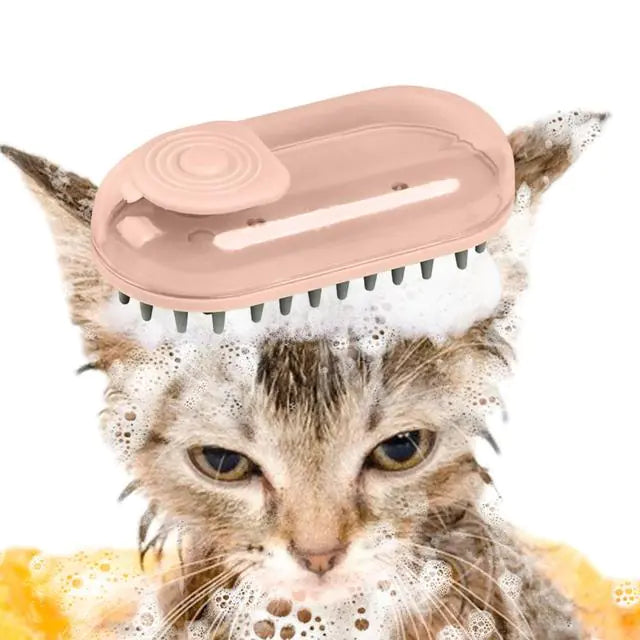 Pink (Rose) colored silicone doggie bath brush with a shampoo dispenser being used on a cat appearing to enjoy the bath.