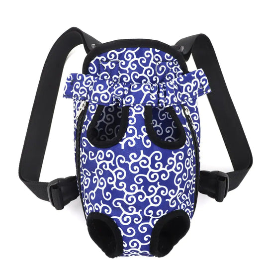 A Blue (Ocean) canvas pet carrier backpack with a white swirl pattern, featuring adjustable straps and a padded base.