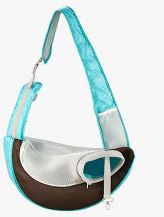 Light Blue (Sky) doggie carrier sling bag wih gray and brown accents on a white background.