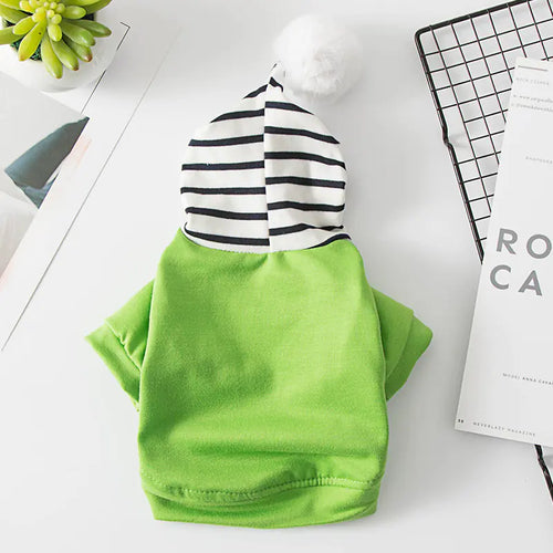Green (Spring) polyester pet hoodie with black and white striped hood and white pom-pom, cozy and comfortable for a fun dog walk.