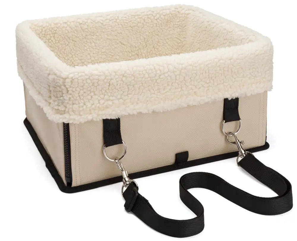 Beige (Cream) doggie car booster seat with beige interior and adjustable black straps. Carrier is lightweight & foldable.