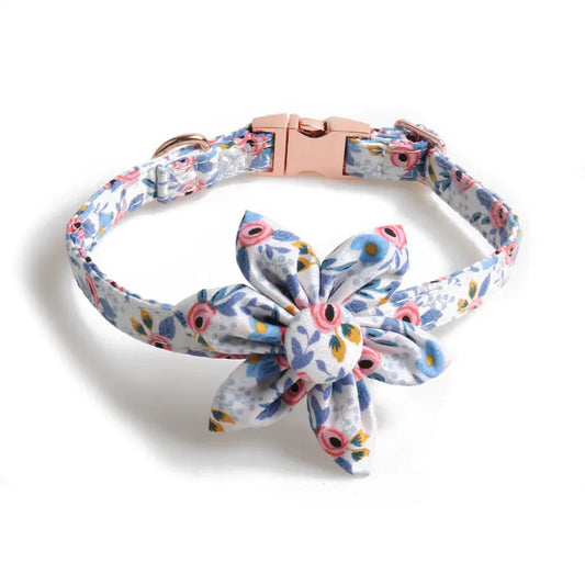 Adjustable Blue (Ocean) floral patterned dog collar with blue accents and matching flower on a white background.