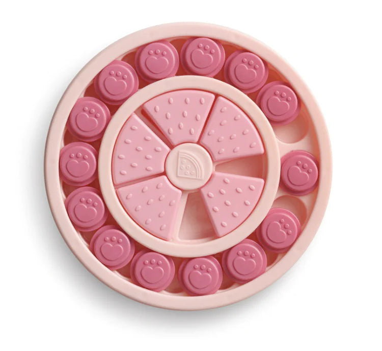 Round Pink (Rose) Doggie Puzzle Board with slots for treals. Design combines snack time with game time for your curious pet.