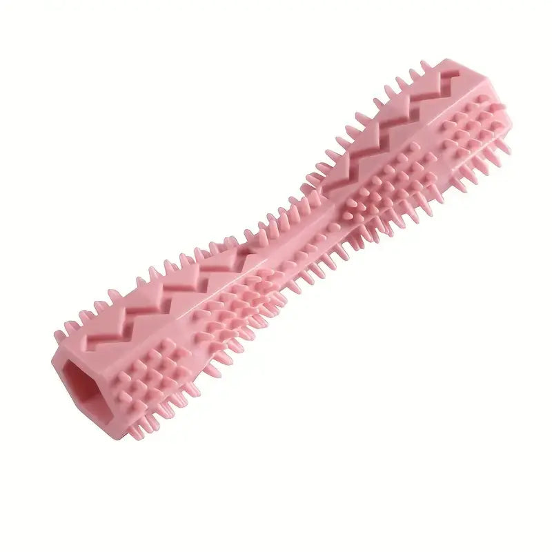 Pink dog chew toy made of pet-safe soft rubber with textured ridges that provide both teeth cleaning and gum massage.