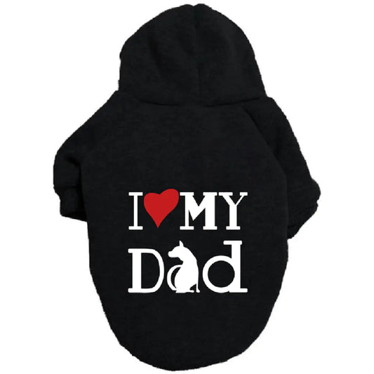 Black pet hoodie with ‘I ❤️ MY DAD’ print on a white background. Made of soft polyester for your dog's warmth and comfort.