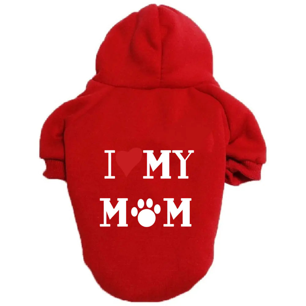 Red dog hoodie with ‘I ❤️ MY MOM’ print on a white background. Made of soft polyester for your pet's warmth and comfort.