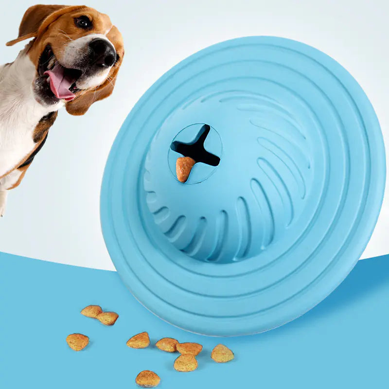 Light Blue (Sky) Natural Rubber Dog Chew Treat Dispenser loaded with treats. Pet waits anxiously in the background.