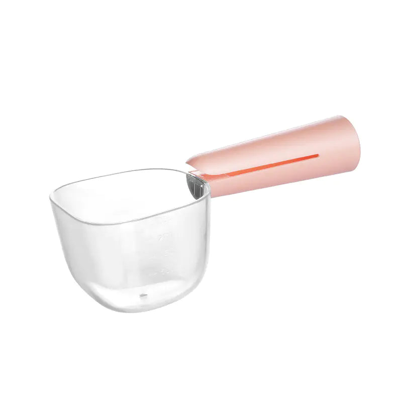 Clear scoop that can be used to precisely measure dog food.. The Pink (Rose) handle, doubles as a bag clip.