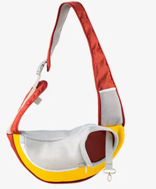 Red (Ruby) doggy carrier sling bag wih gray and yellow accents on a white background.