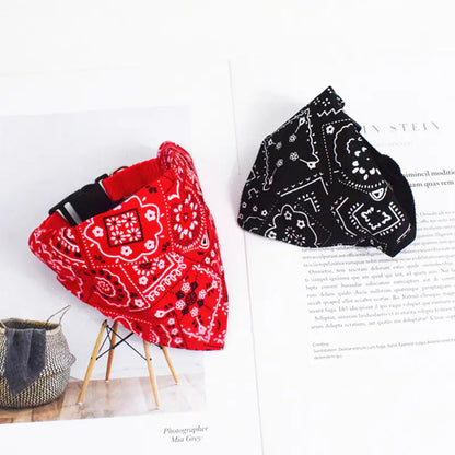 Two different sized patterned bandanas; One Red (Ruby) and the other Black (Midnight) shown with adjustable strap and buckle. 