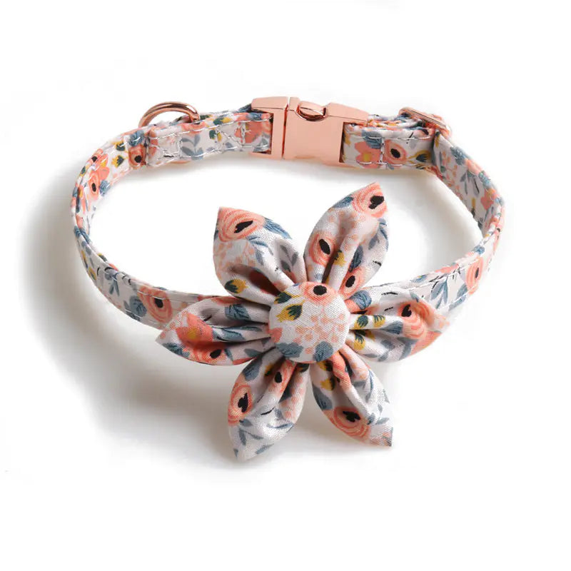 Adjustable  Orange (Autumn) floral patterned puppy collar with orange accents and matching flower on a white background.