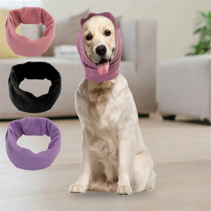 Dog wearing a pink calming dog ears cover with three additional covers displayed in the foreground.